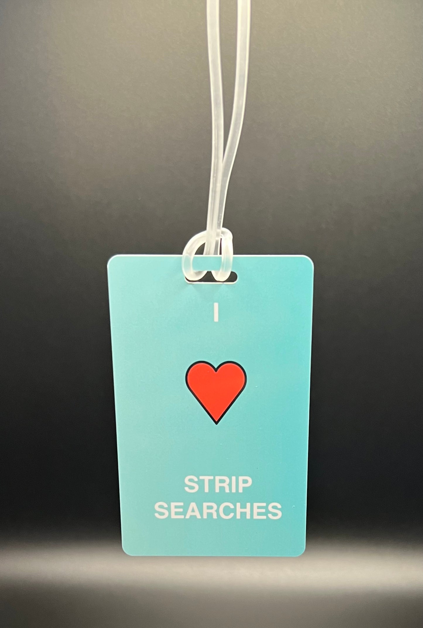Strip Search luggage tag